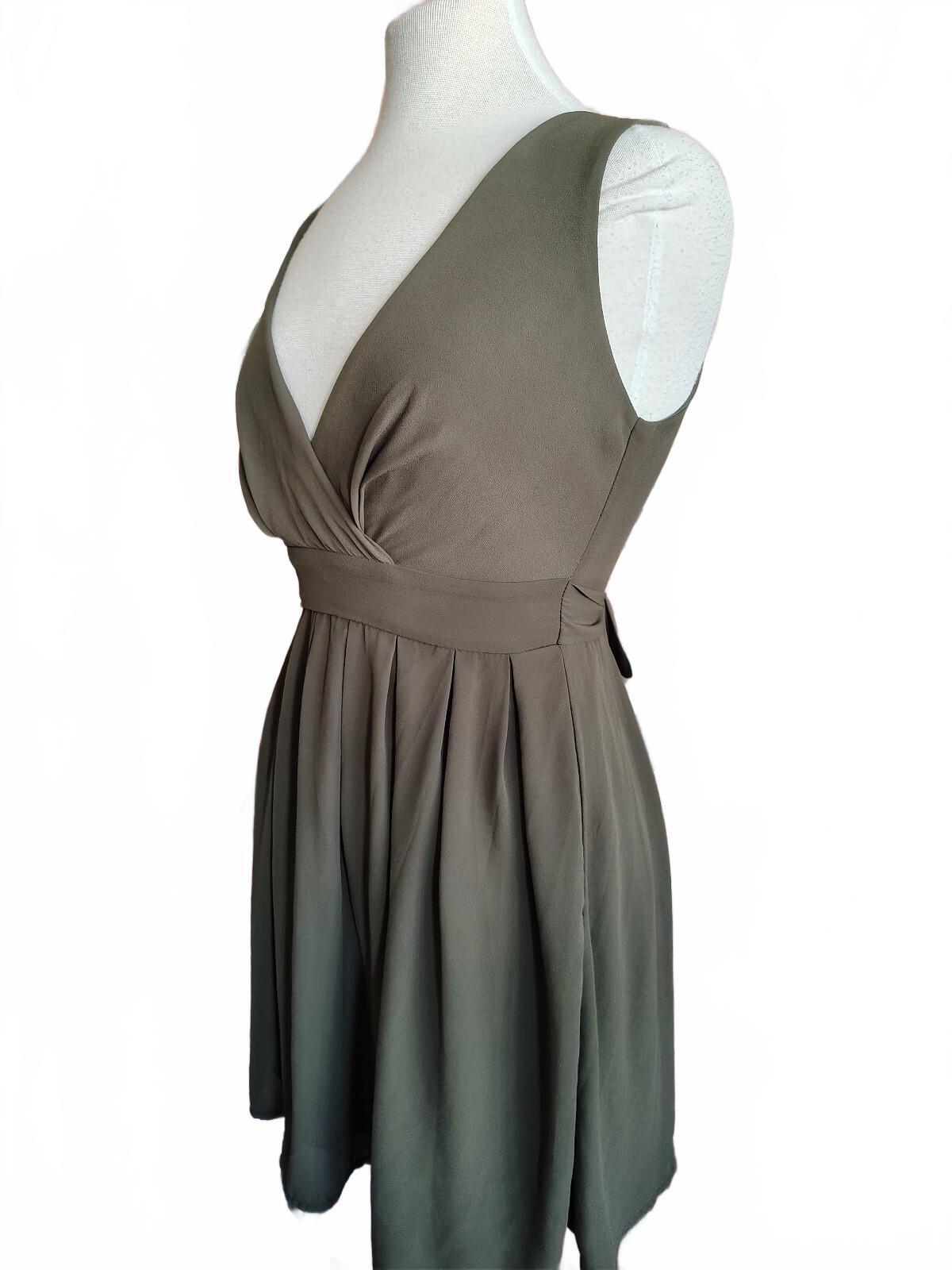 Sleeveless Olive Green V-Neck Dress with Pleated Skirt sz. 7