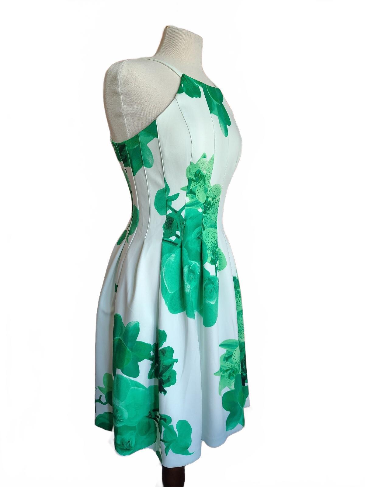 Calvin Klein Size 4 White Dress with Green Floral Print